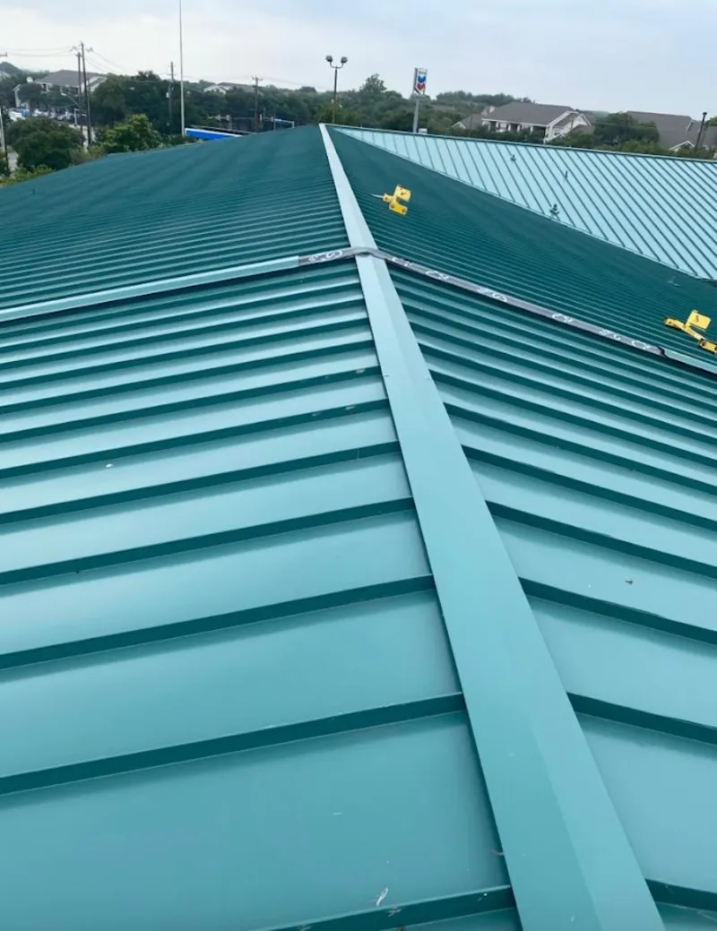 Green commercial metal roof ridge and valley for Metal Roof Repair in Lander